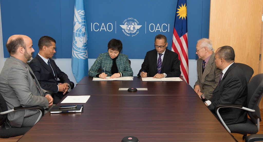 icao dr. fang liu signing a usap cma memorandum with a representative from malaysia